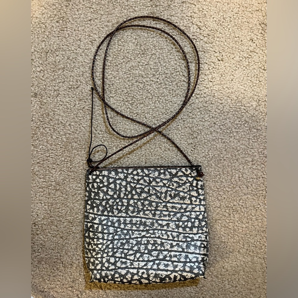 B.May white and black purse handbag